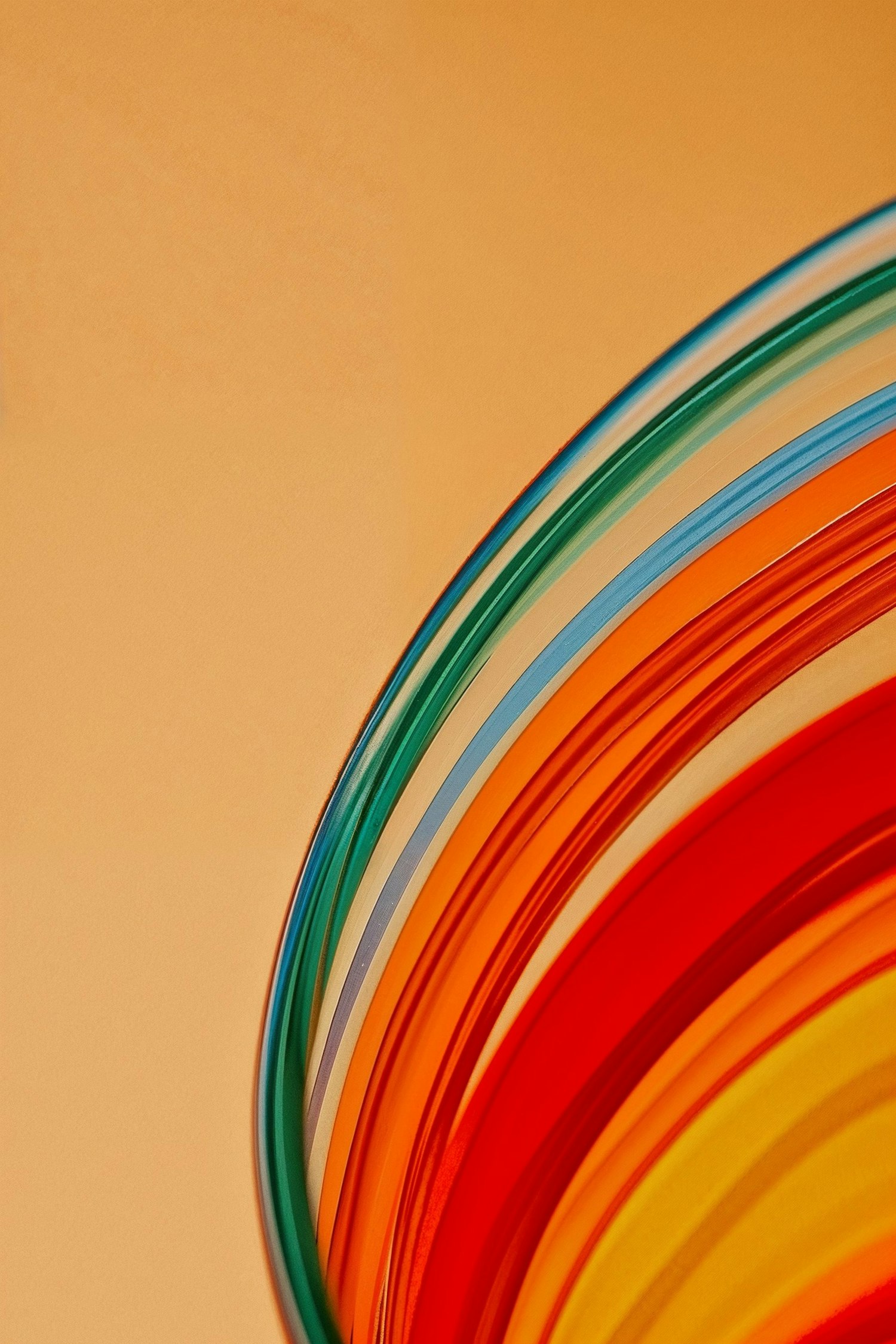Colorful Plate Stack on Peach Background