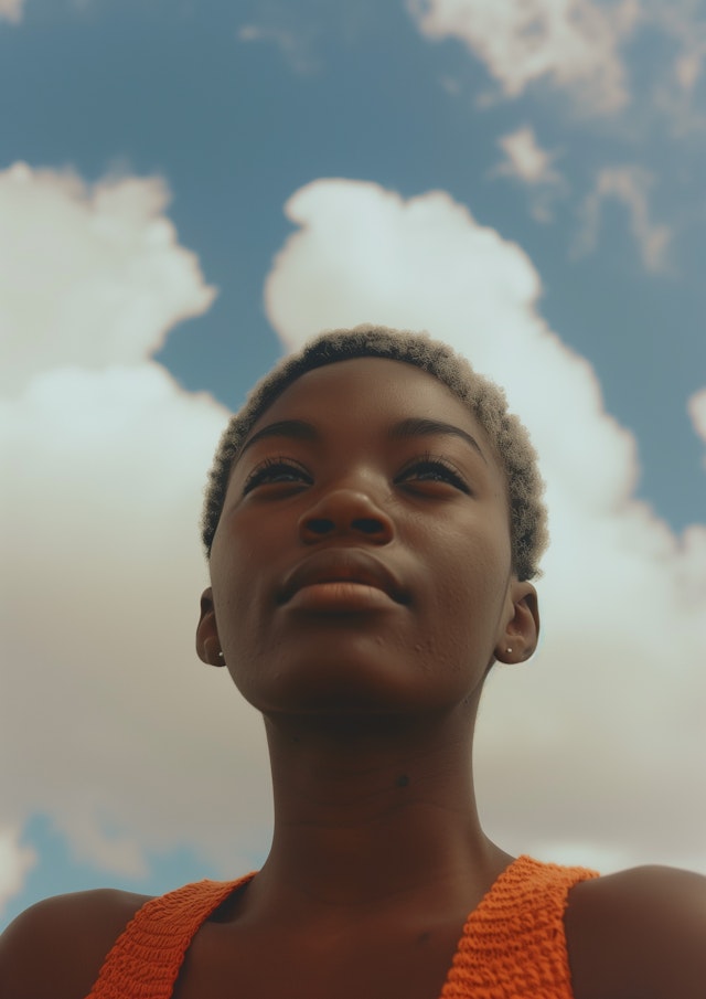 Serene Portrait of Young Woman with Cloudy Sky