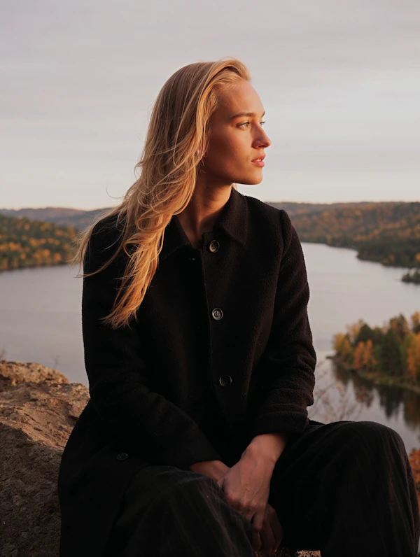 Woman by Autumn Lake