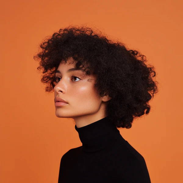 Profile Portrait with Orange Background