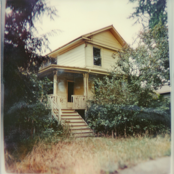 Abandoned House in Overgrown Vegetation