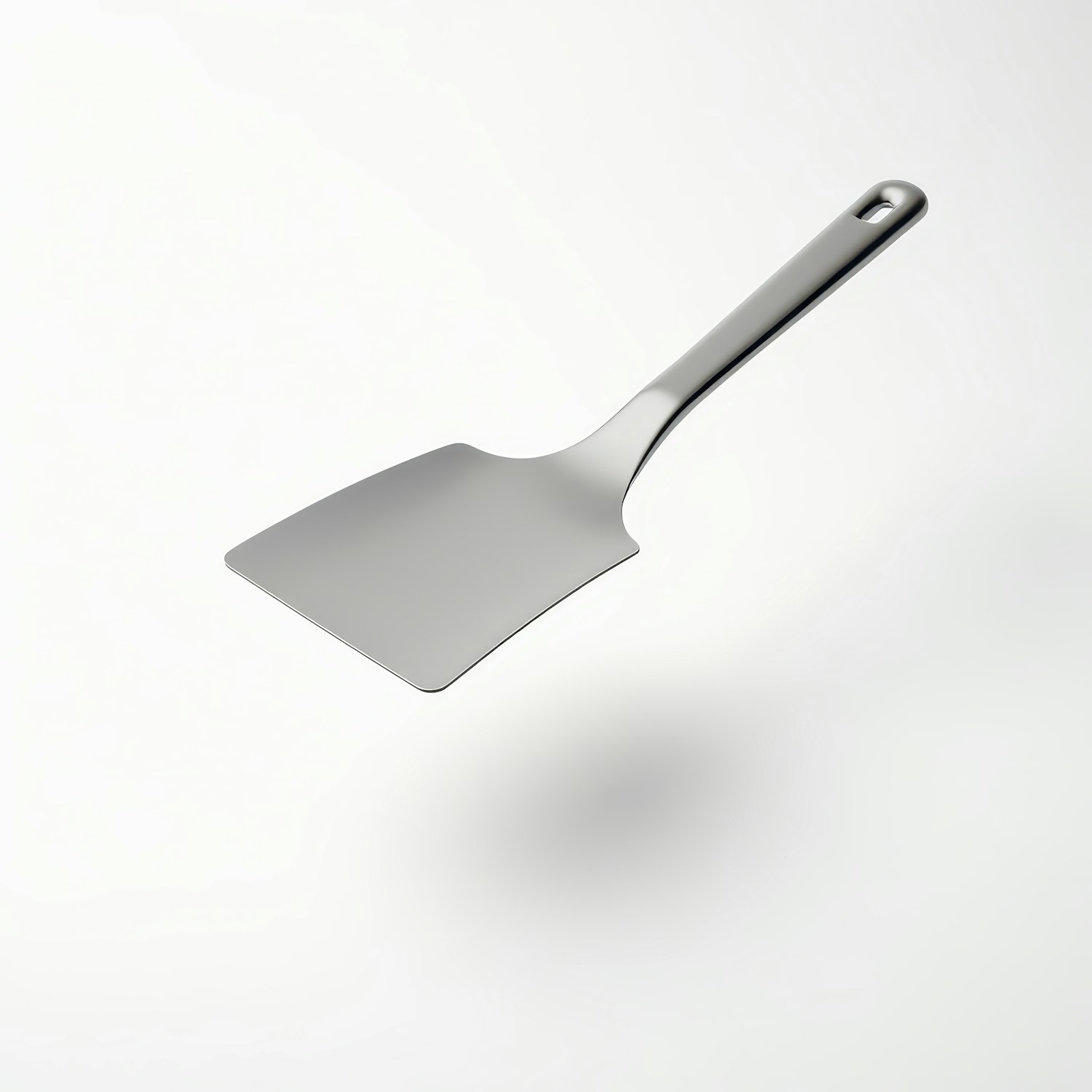 Metallic Spatula on Light Background