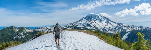 Hiker in Snowy Mountains