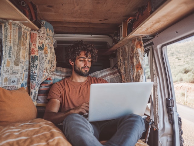 Man Working in Cozy Van