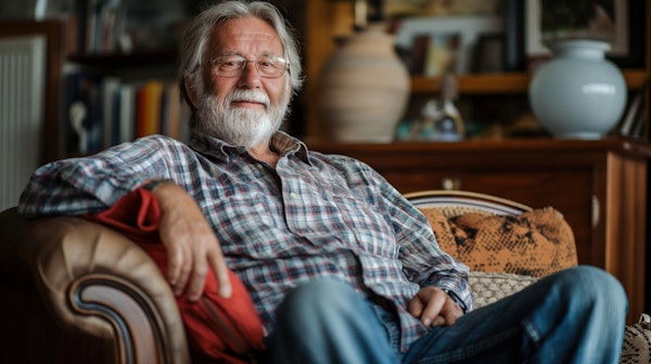 Elderly Man in Leather Armchair