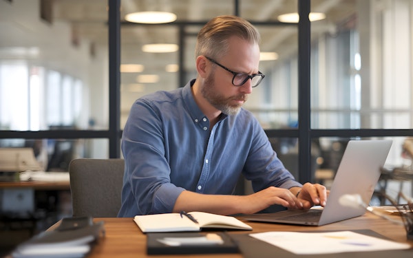 Focused Professional at Modern Office