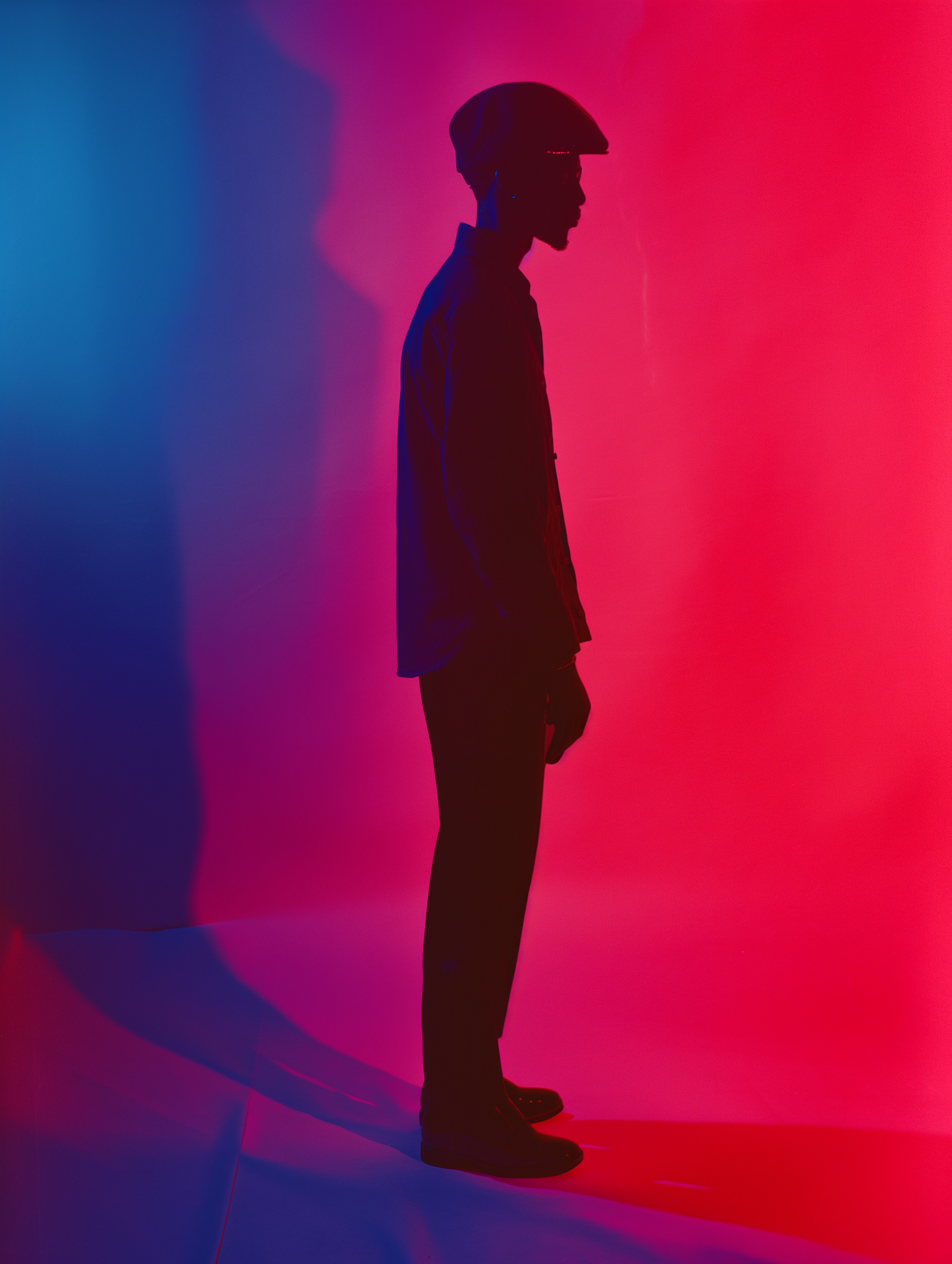 Contemplative Silhouette in Blue and Pink