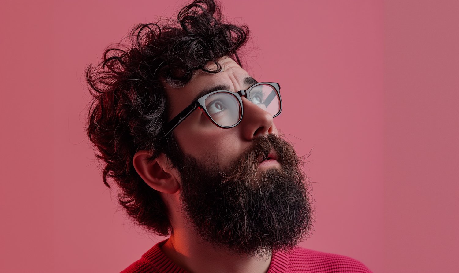 Thoughtful Man with Beard and Glasses