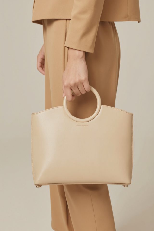 Close-up of Handbag and Hand