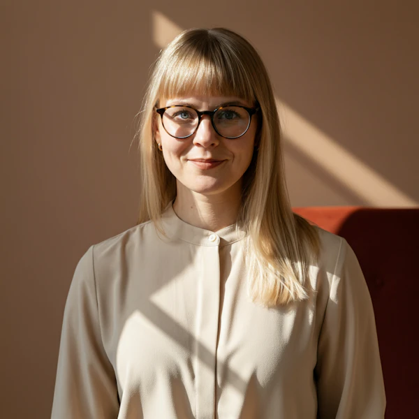 Portrait of a Woman with Blonde Hair and Glasses