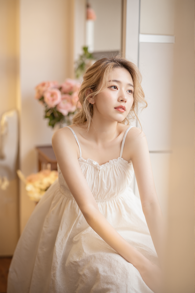 Dreamy Woman by Window