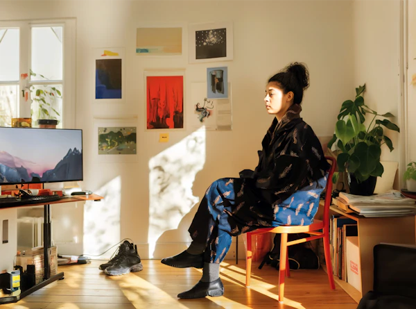 Contemplative Individual in a Cozy Room