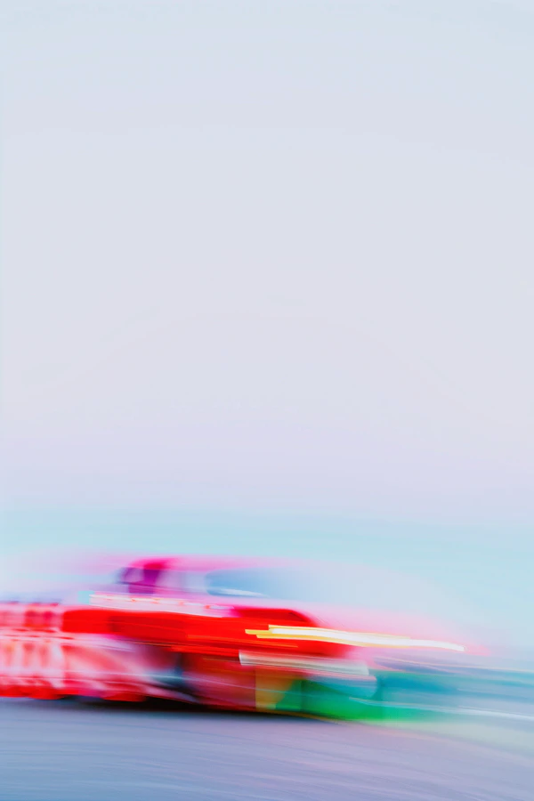 Red Race Car in Motion