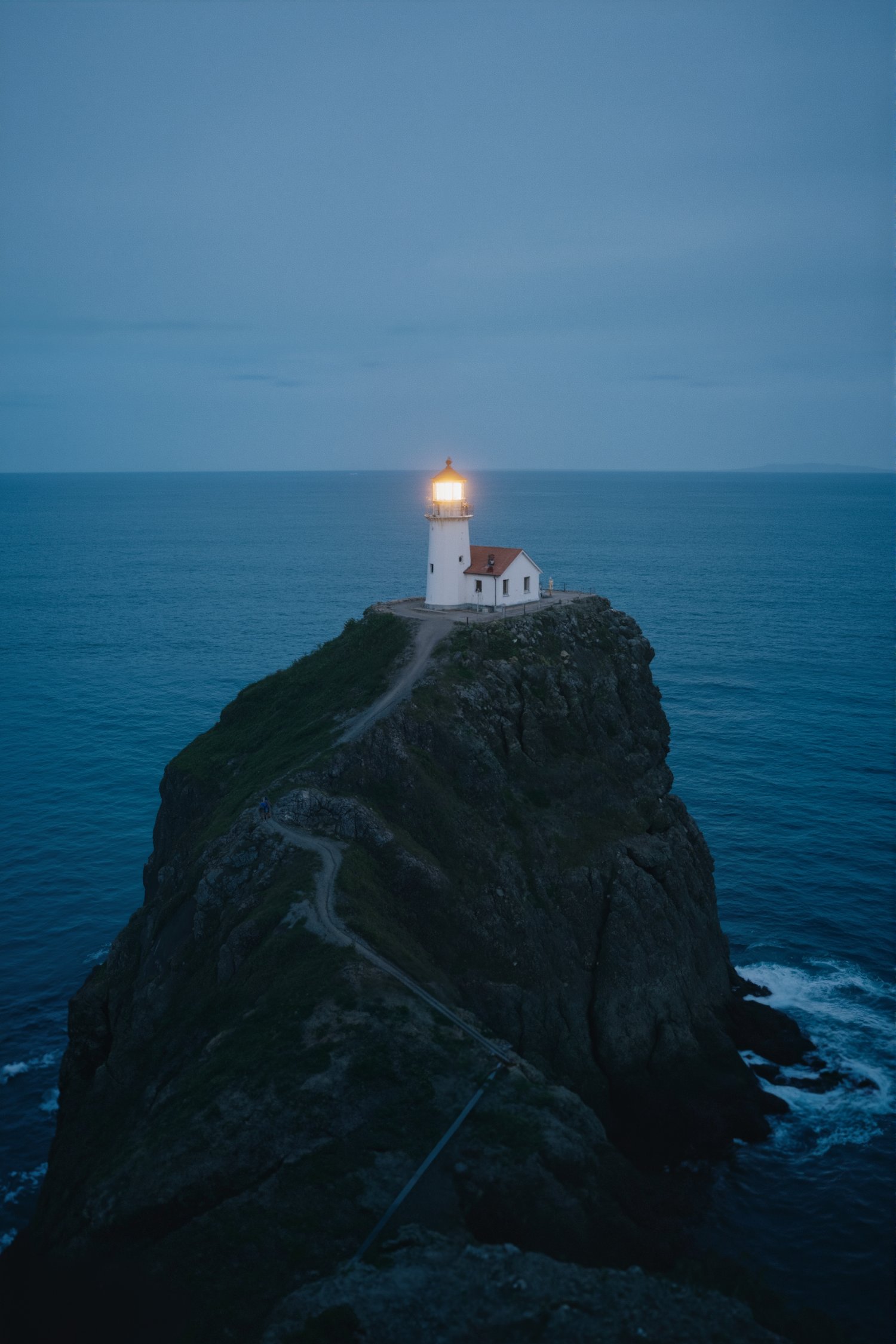 Lighthouse on Rugged Cliff