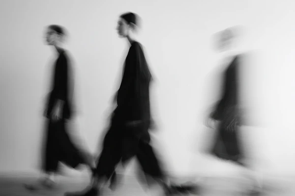 Blurred Figures Walking
