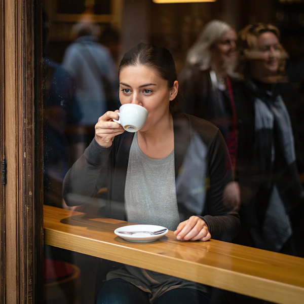 Woman in Cozy Café