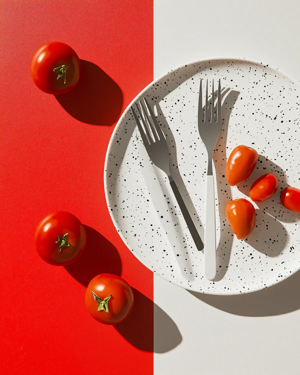Tomatoes and Cutlery Composition