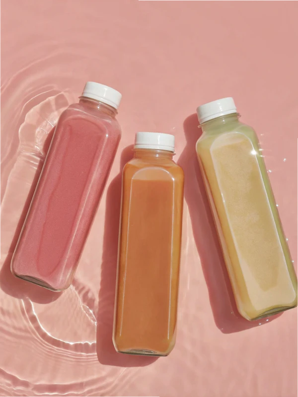 Glass Bottles on Pink
