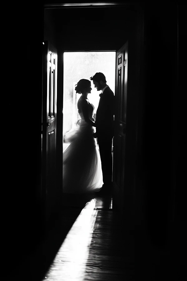 Silhouetted Couple in Doorway