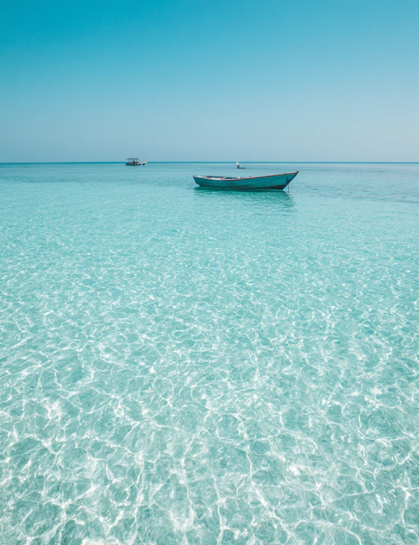 Serene Boat on Turquoise