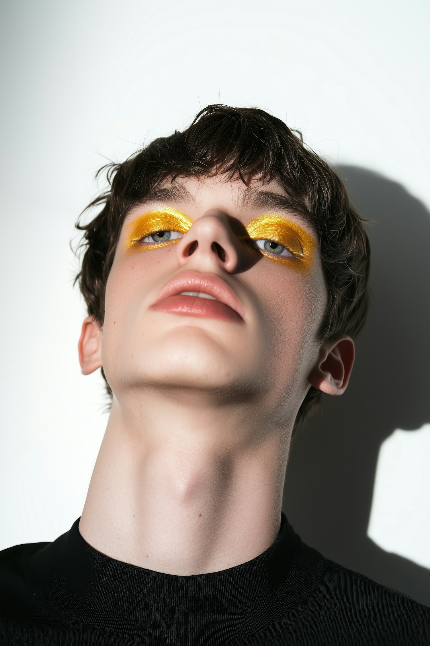 Striking Pose with Metallic Yellow Eyeshadow