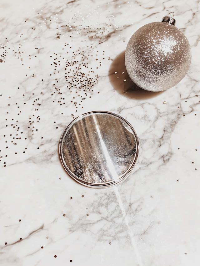 Silver Christmas Ornament on Marble