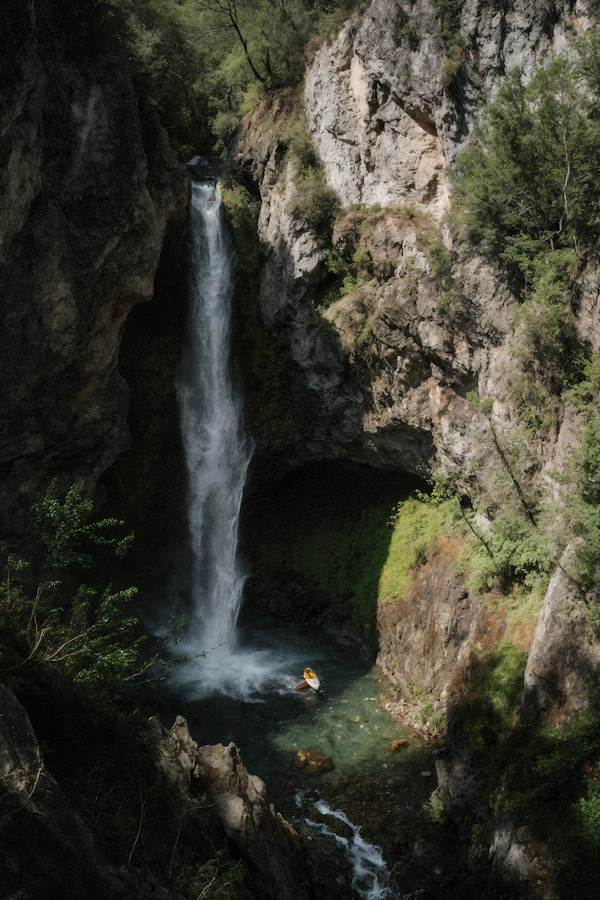 Waterfall and Kayaker
