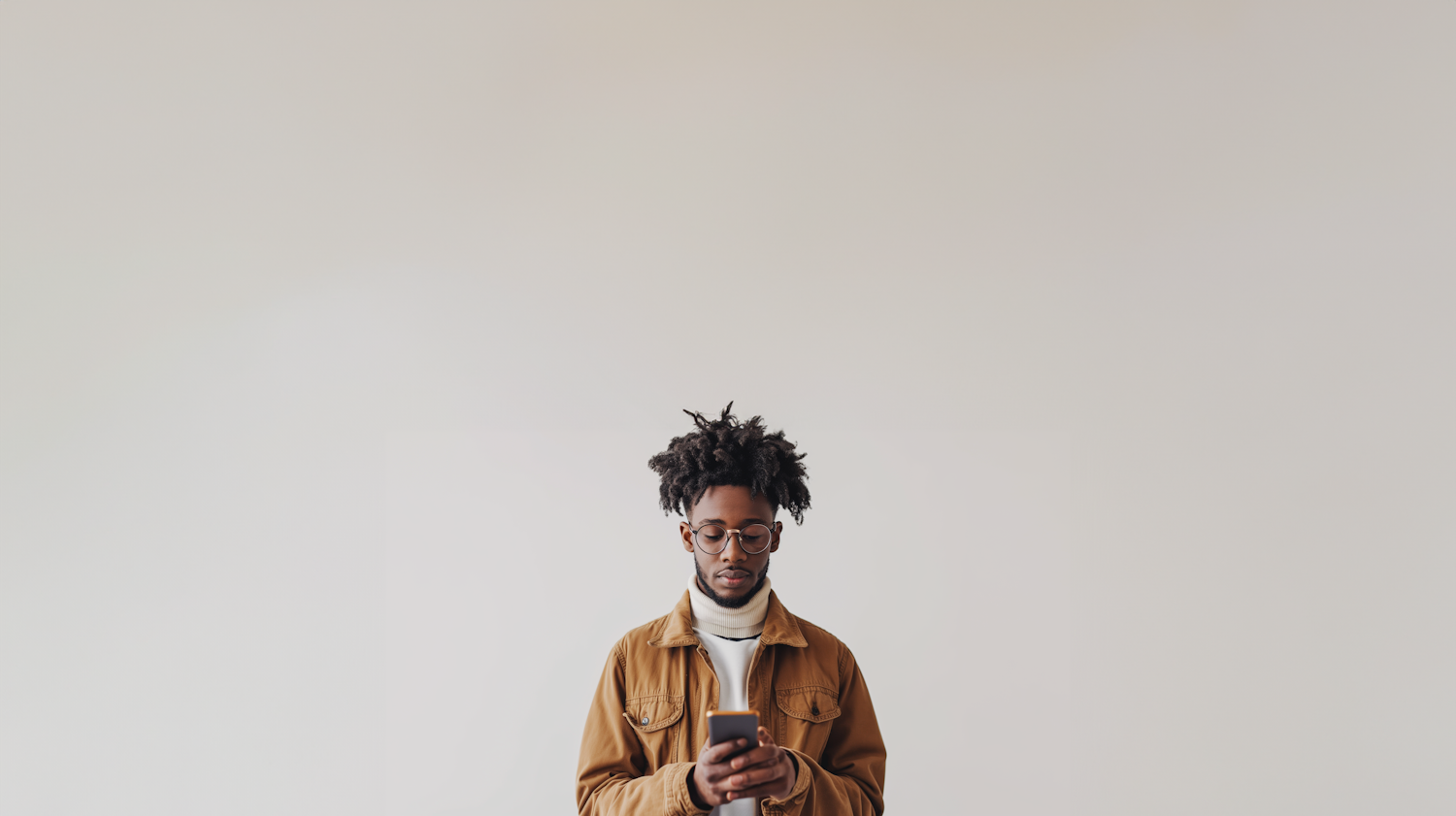 Casual Tech-Engaged Man with Textured Hair