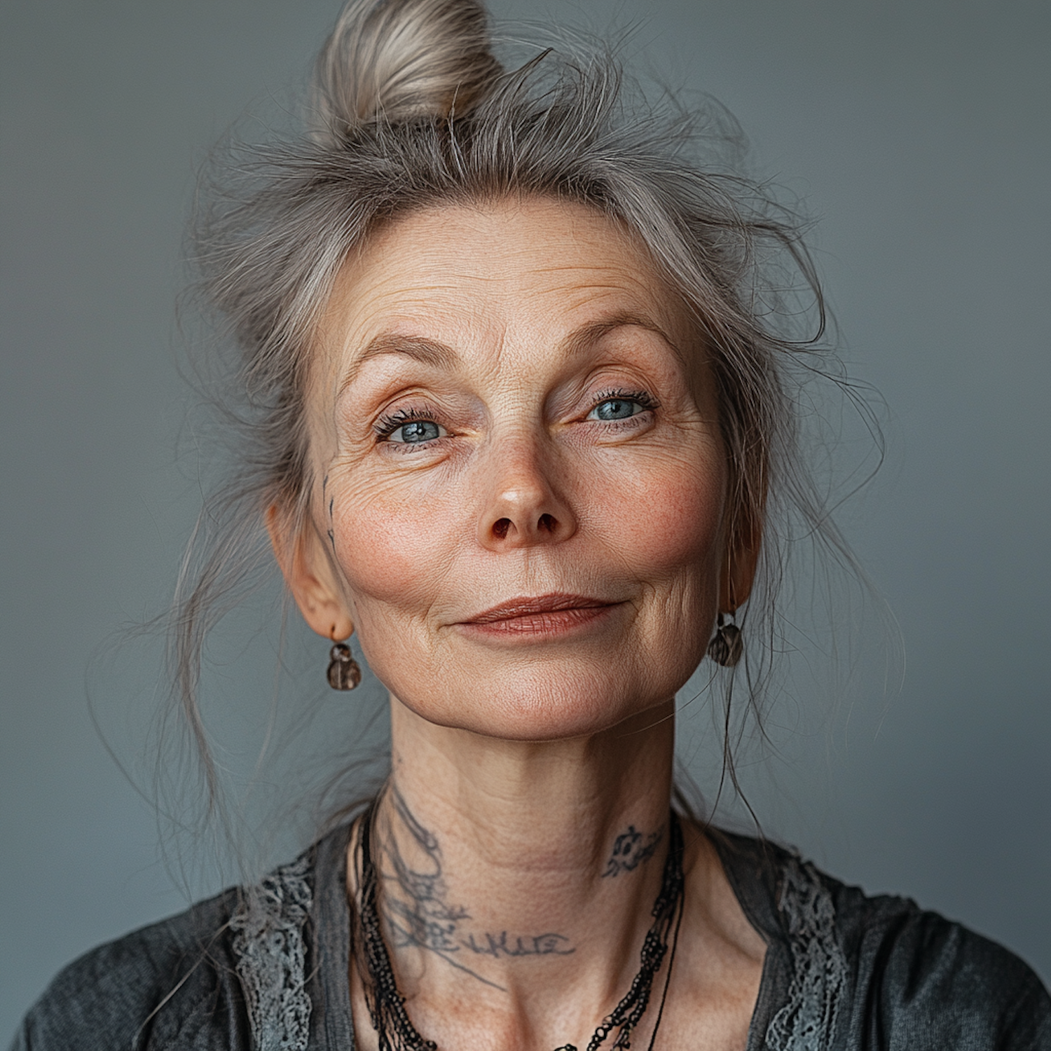 Serene Older Woman with Neck Tattoo