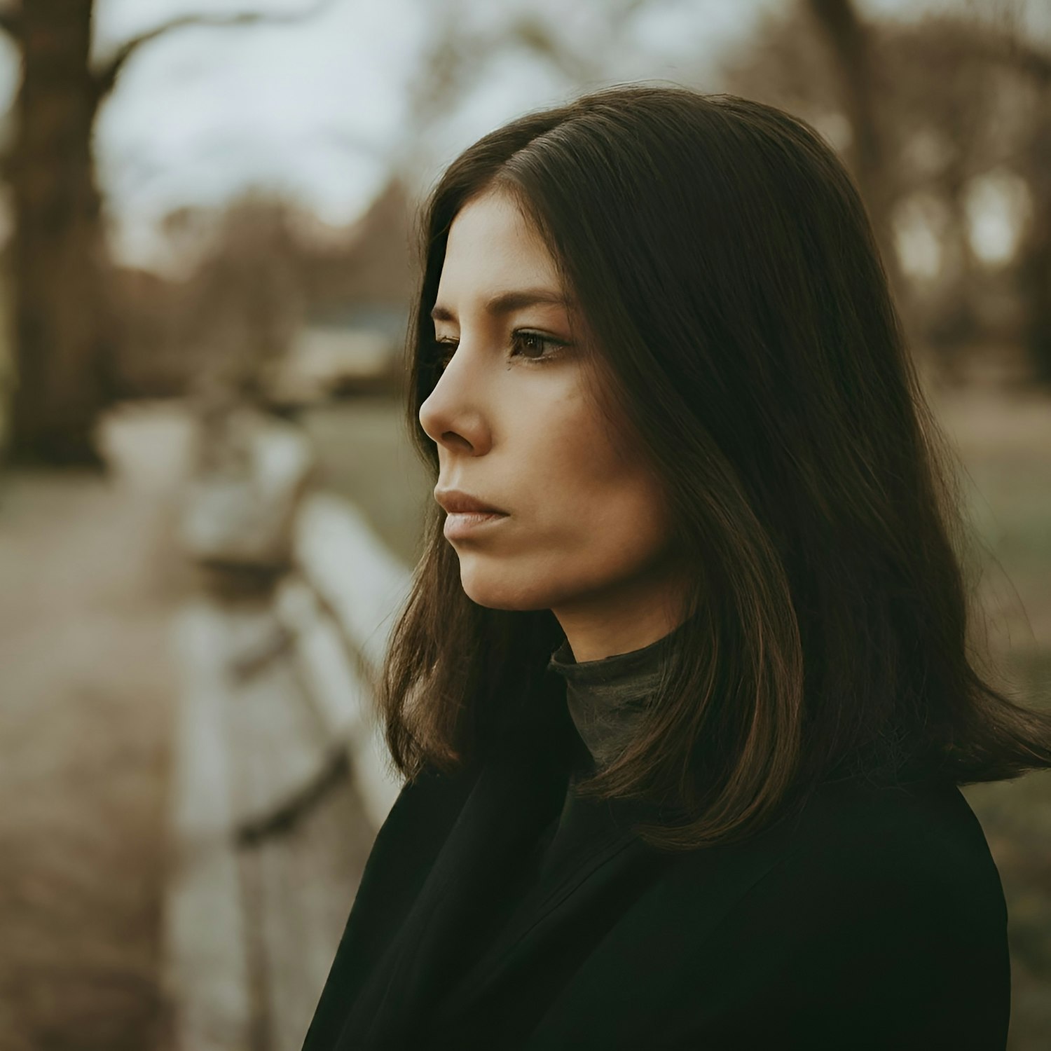 Contemplative Woman at the park