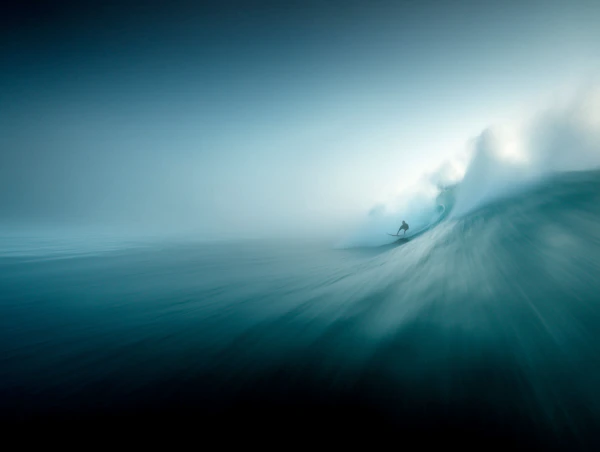 Surfer on Massive Wave