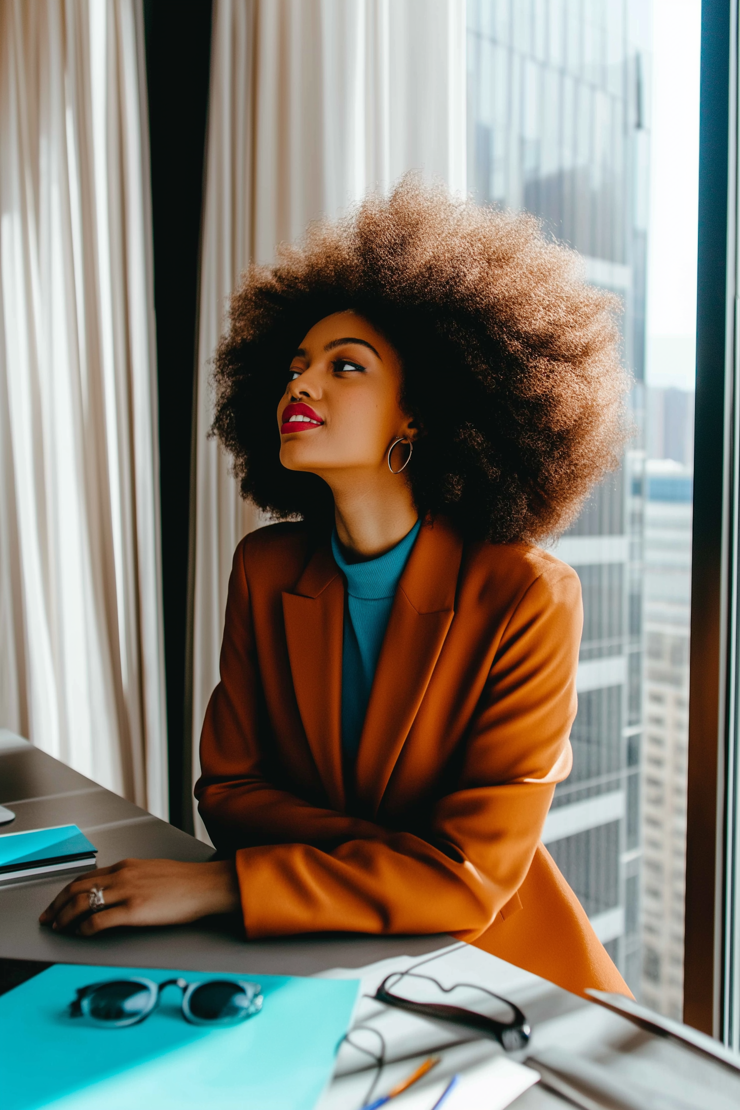 Woman with Afro at Desk