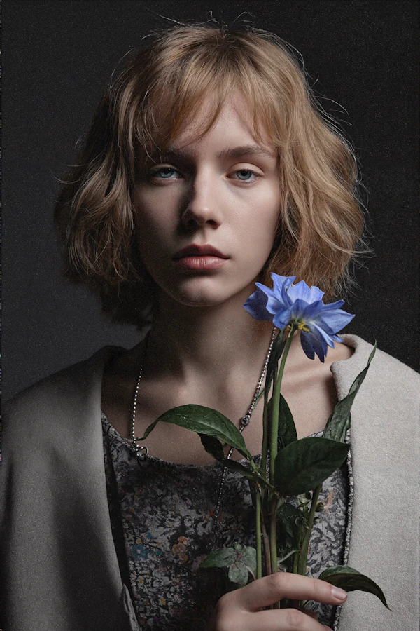 Portrait With Blue Flower