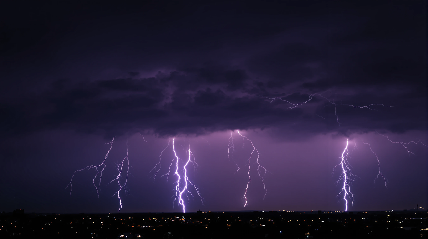 Dramatic Lightning Storm Over Cityscape