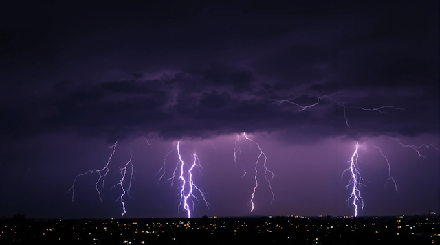 Dramatic Lightning Storm Over Cityscape