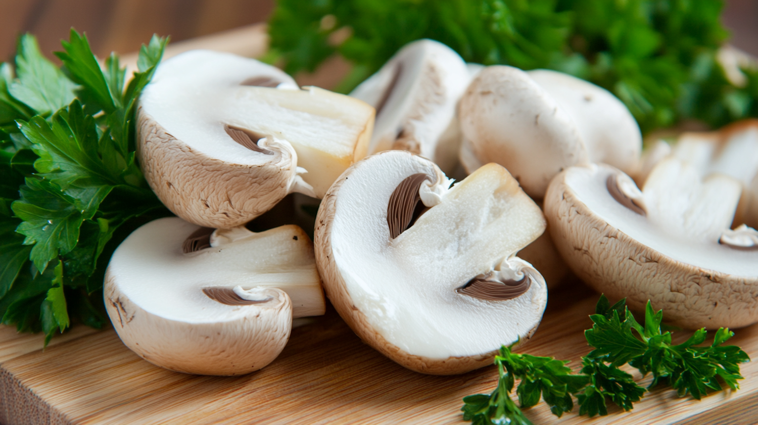 Sliced Mushrooms on Cutting Board