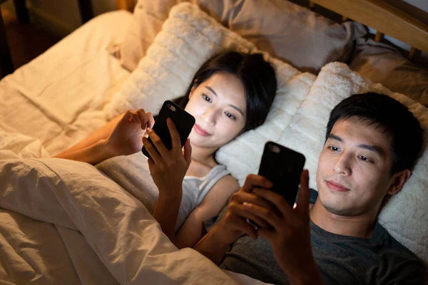 Couple Relaxing in Bed