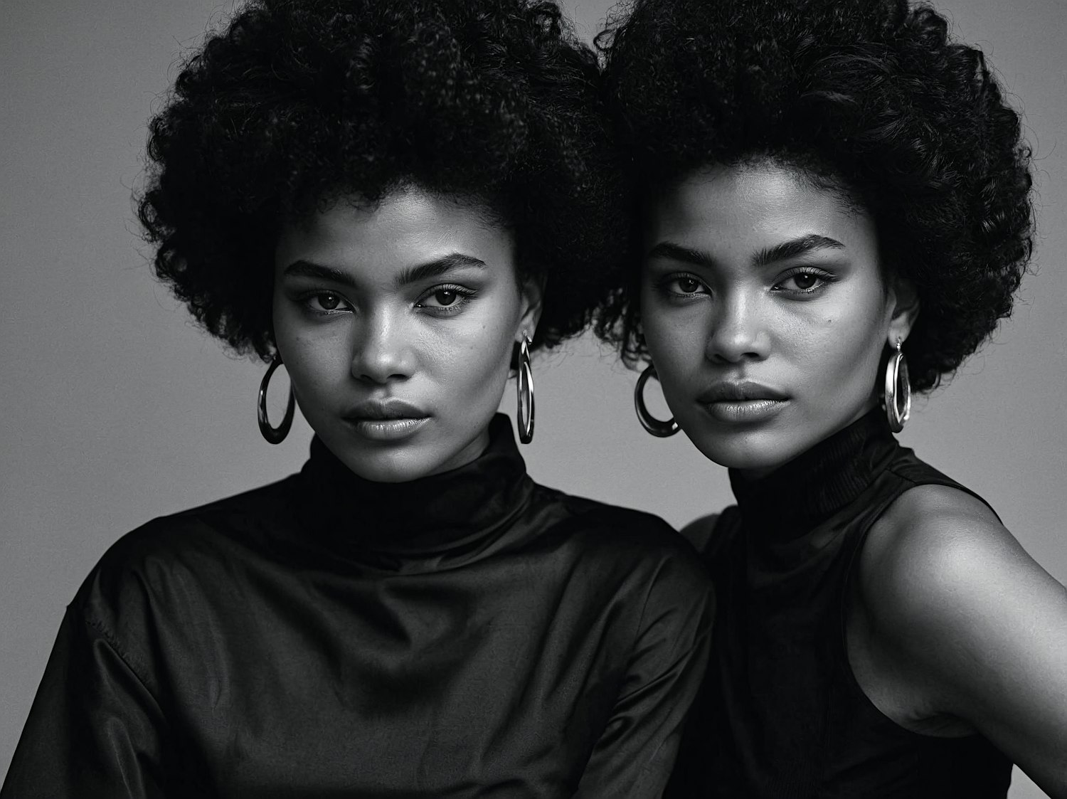 Twin Women with Curly Hair