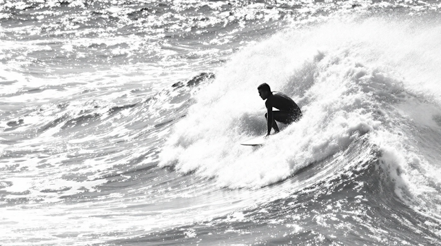 Surfer Riding a Wave