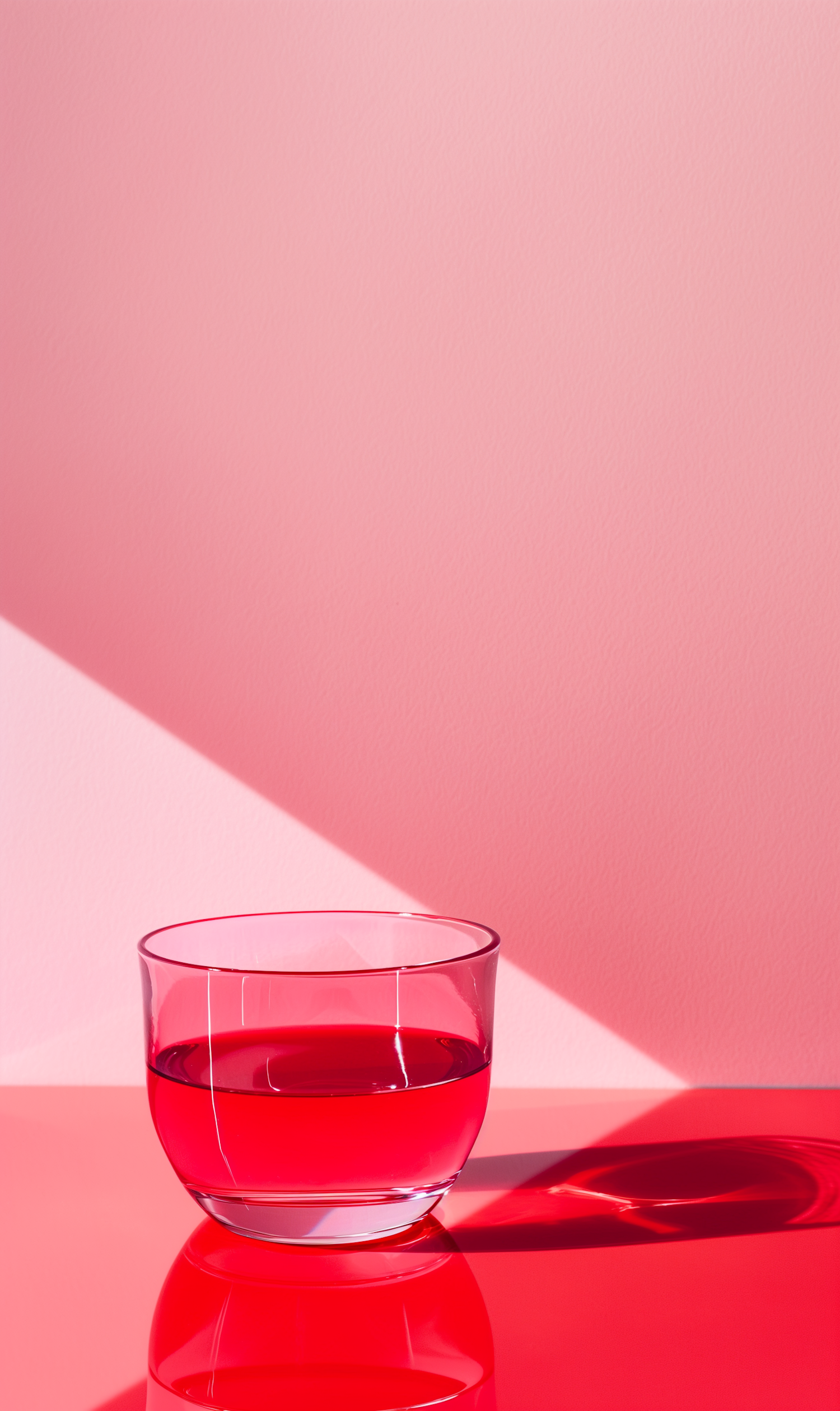 Tranquil Reflection of Glass Bowl with Red Liquid