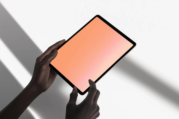 Hands Holding Tablet