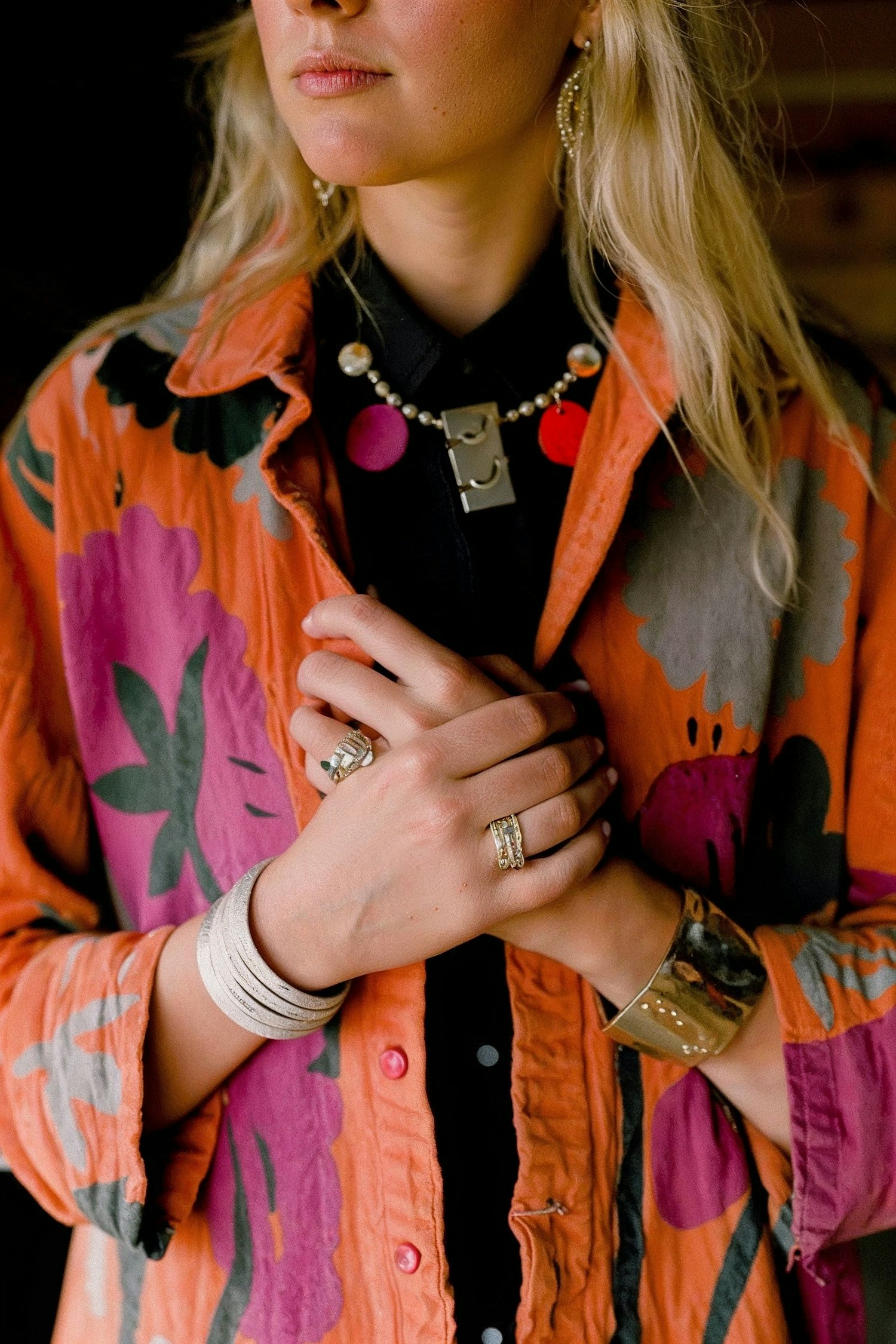 Woman with Jewelry in Floral Jacket