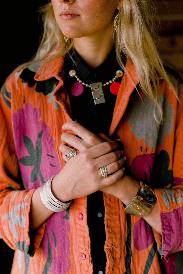 Woman with Jewelry in Floral Jacket