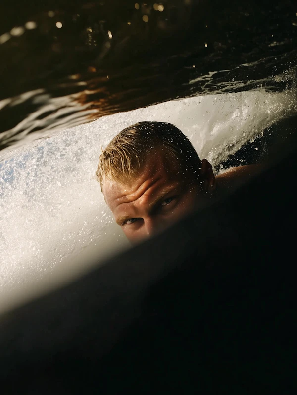 Man Emerging from Wave