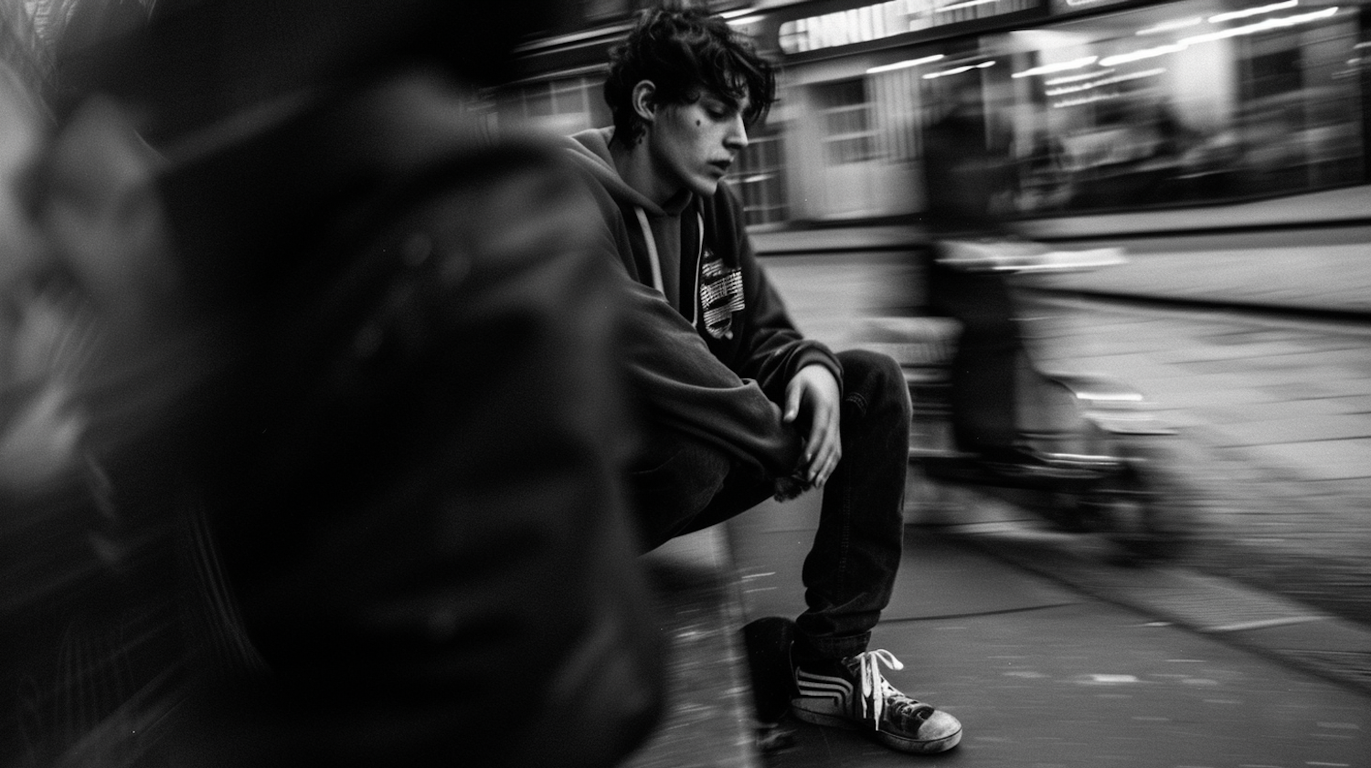 Contemplative Young Man in Urban Setting