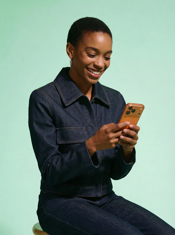 Smiling Person with Phone