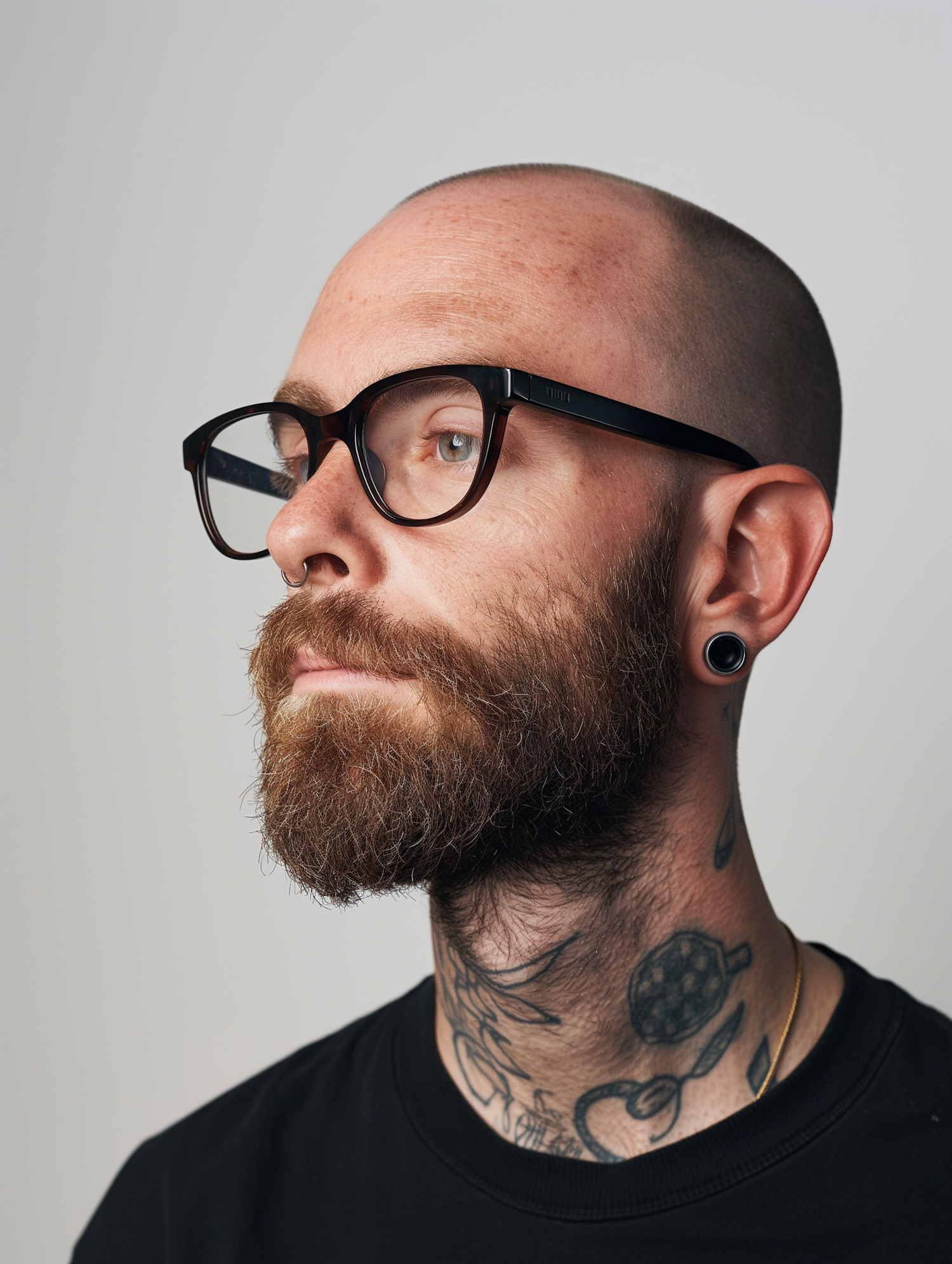 Portrait of Tattooed Man with Beard