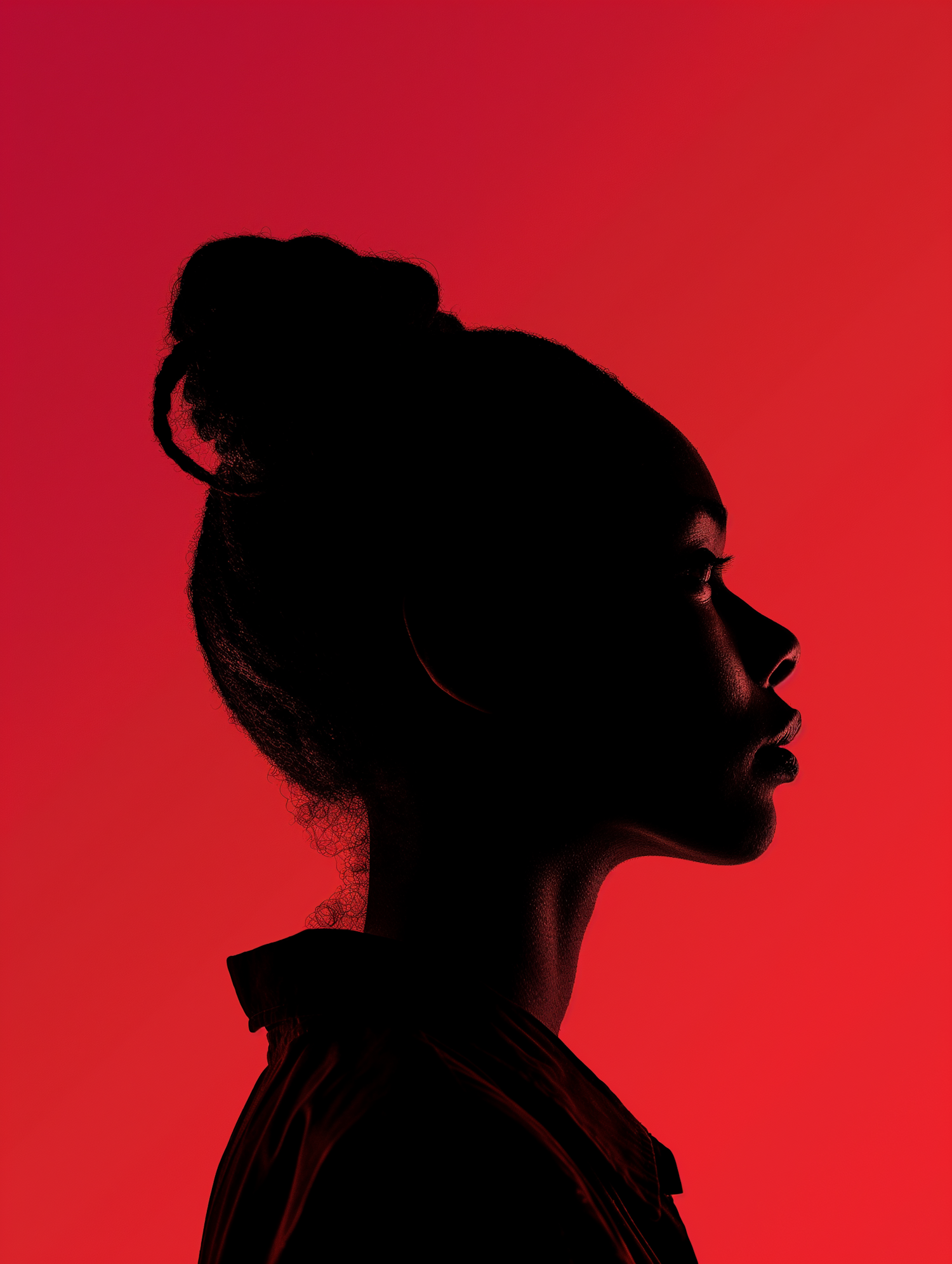 Silhouette of a Woman on Red Background