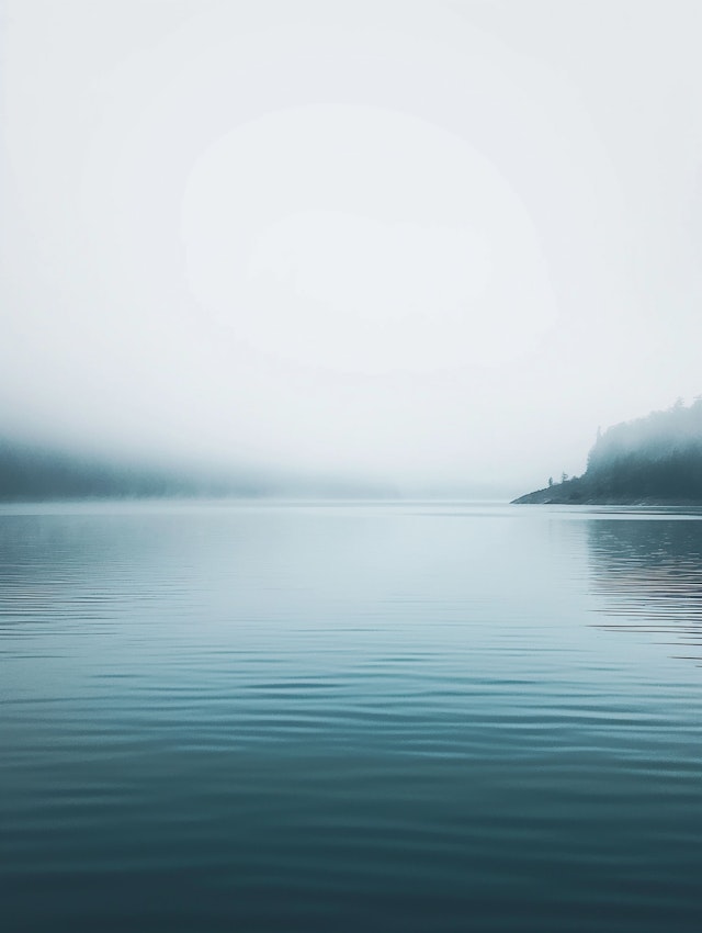 Serene Lakescape in Mist