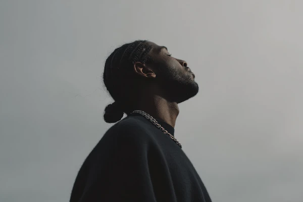 Profile of Man in Cornrows